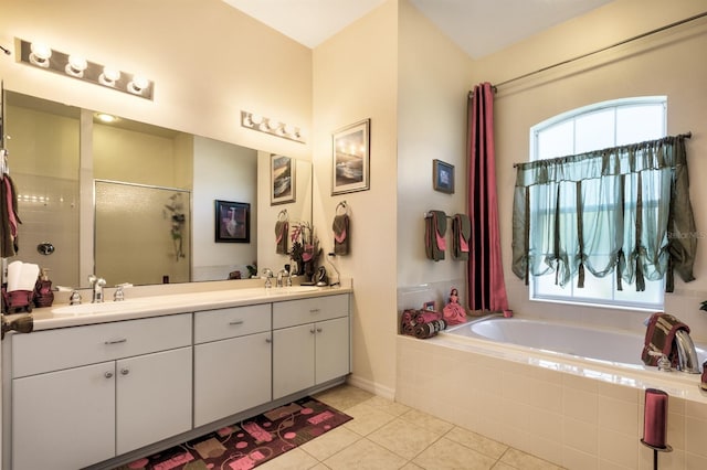 bathroom with separate shower and tub, tile patterned floors, and vanity