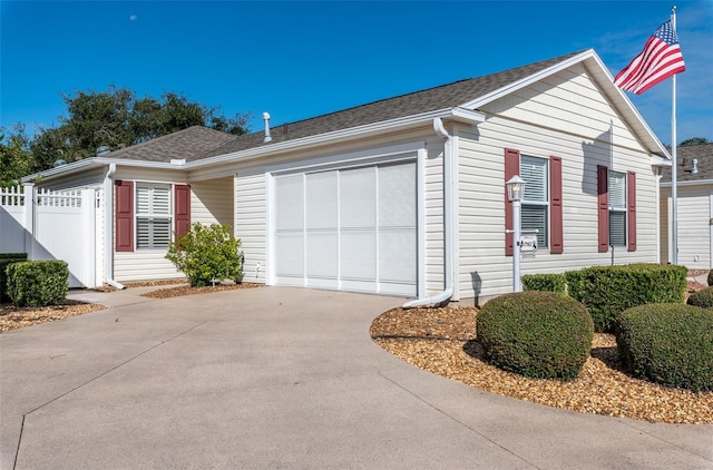 view of side of property featuring a garage