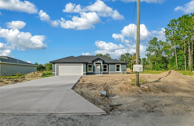 single story home featuring a garage