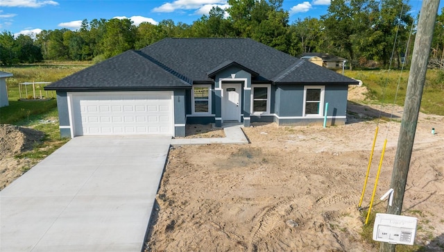 ranch-style house with a garage