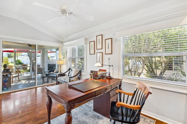 office area with hardwood / wood-style flooring, plenty of natural light, and vaulted ceiling