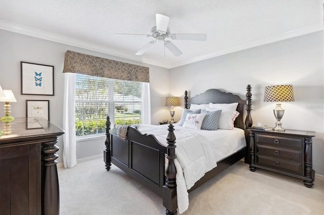 bedroom featuring light carpet, ornamental molding, and ceiling fan