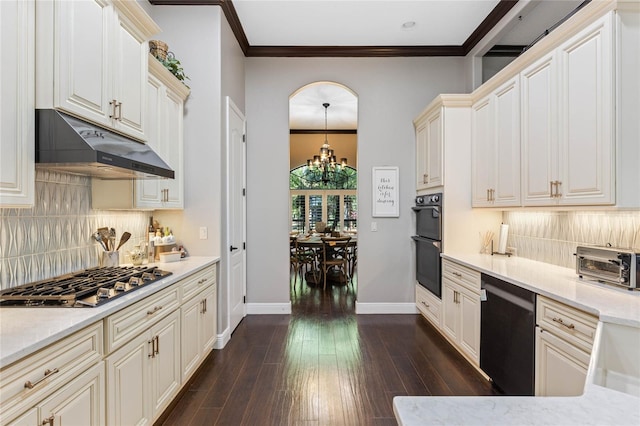 kitchen with crown molding, pendant lighting, dark hardwood / wood-style flooring, and black appliances