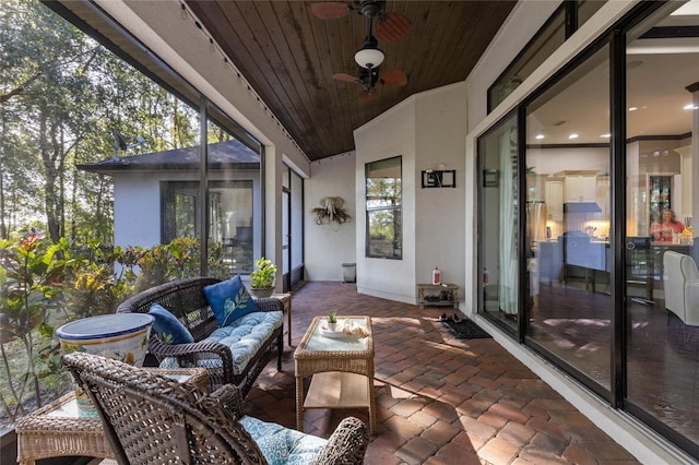 view of patio featuring an outdoor living space and ceiling fan