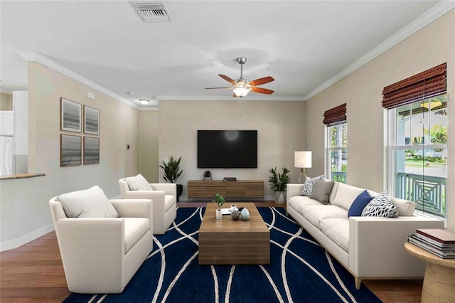 living room featuring ceiling fan, hardwood / wood-style floors, and crown molding