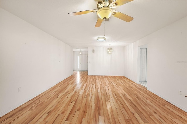 unfurnished room featuring light hardwood / wood-style floors and ceiling fan