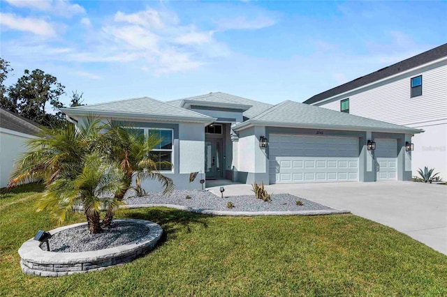 view of front facade featuring a front yard and a garage