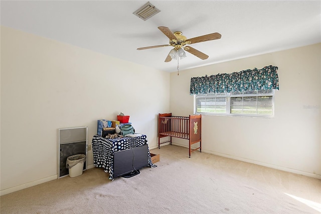 bedroom featuring ceiling fan and carpet flooring