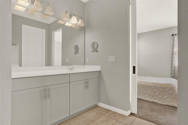 bathroom with vanity and tile patterned flooring