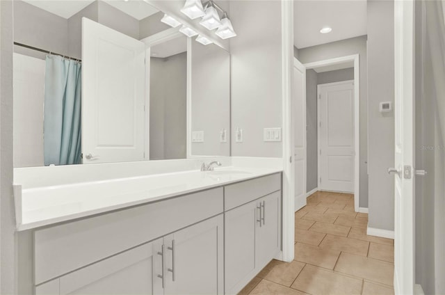 bathroom with vanity and tile patterned floors