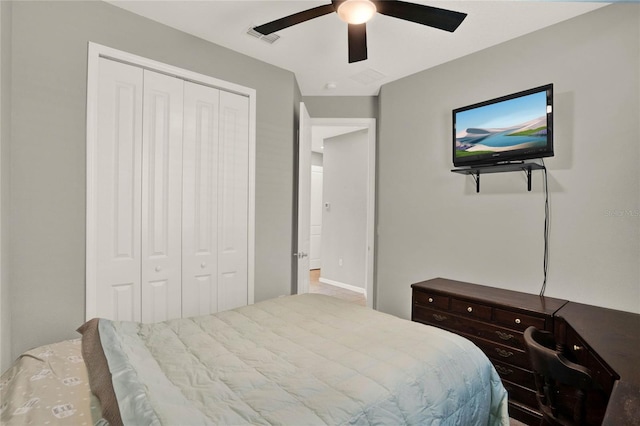 bedroom with a closet and ceiling fan