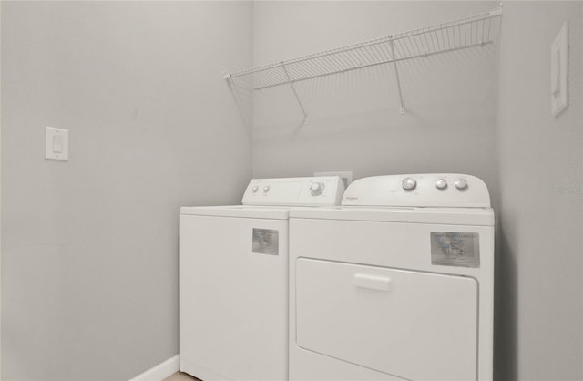 laundry room featuring washer and clothes dryer