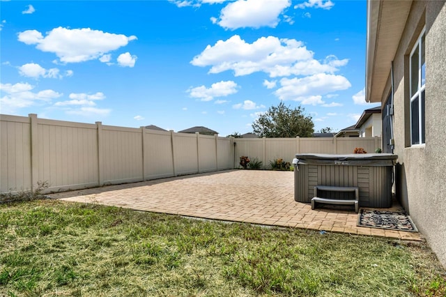 view of patio featuring a hot tub