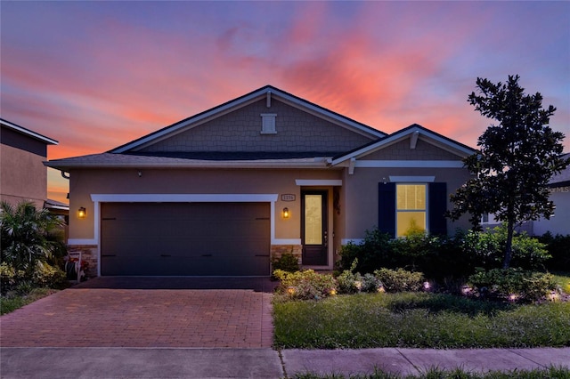 craftsman-style home with a garage