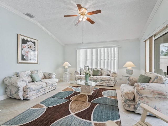 tiled living room with ornamental molding, vaulted ceiling, a textured ceiling, and ceiling fan