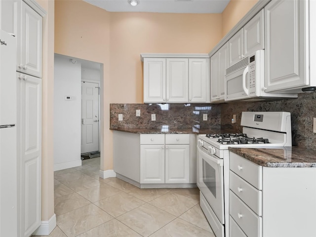 kitchen featuring backsplash, white cabinetry, white appliances, and light tile patterned floors