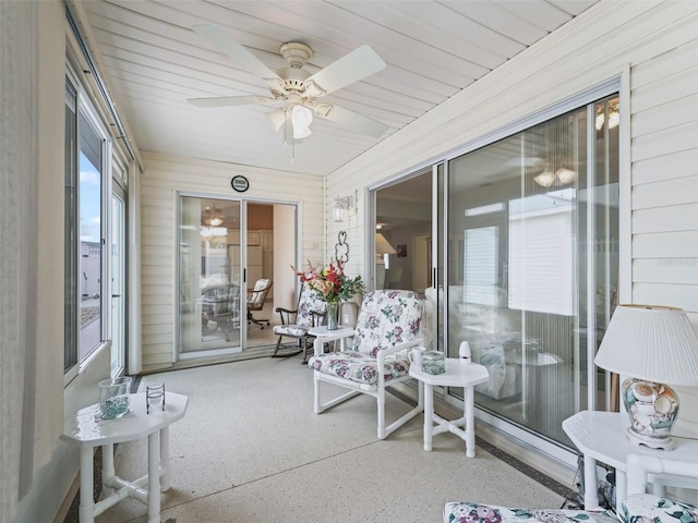 sunroom / solarium with ceiling fan