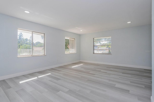6607 Kreidt Dr, Orlando, FL 32818 - unfurnished room featuring recessed lighting, light wood-type flooring, and baseboards