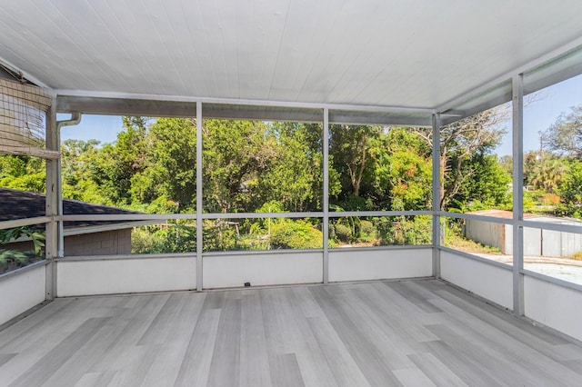 unfurnished sunroom featuring wooden ceiling