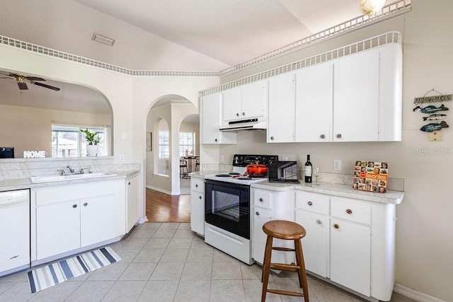 kitchen featuring range with electric stovetop, white cabinets, dishwasher, and ceiling fan