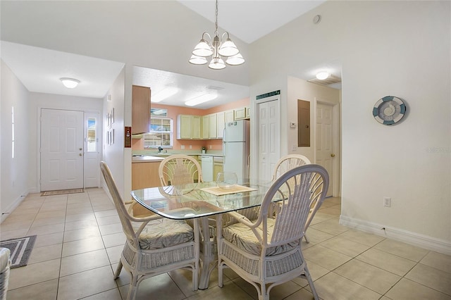 dining room with a chandelier, electric panel, and light tile patterned flooring