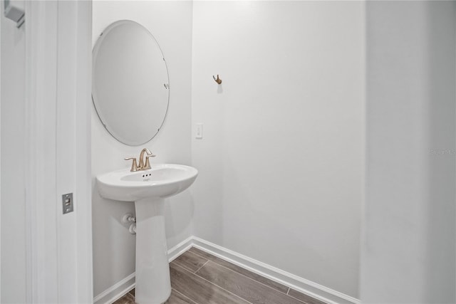 bathroom featuring wood-type flooring