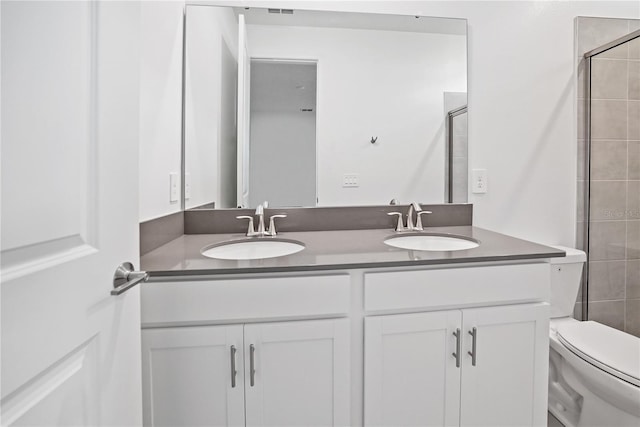 1180 Dora Parc Ln, Mount Dora, FL 32757 - bathroom featuring toilet, tiled shower, and double vanity