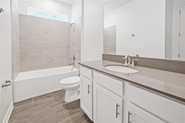 1180 Dora Parc Ln, Mount Dora, FL 32757 - bathroom with toilet, shower / tub combination, vanity, and wood finished floors