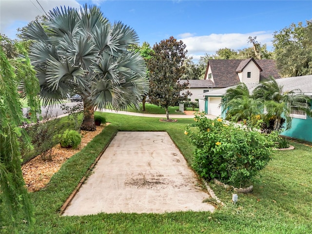 view of community featuring a yard