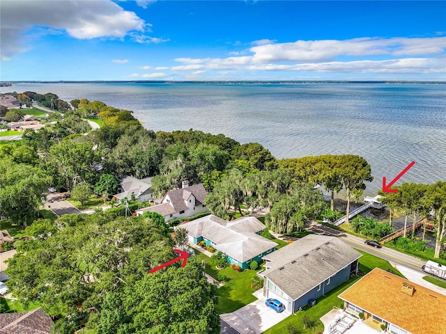 bird's eye view with a water view