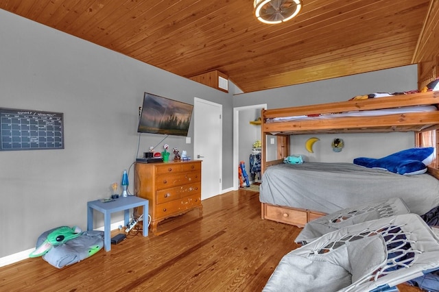 bedroom with lofted ceiling, wood-type flooring, and wooden ceiling