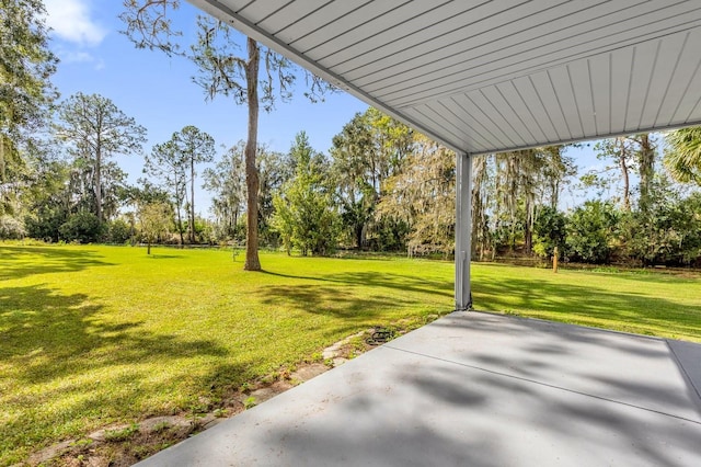 view of yard with a patio area