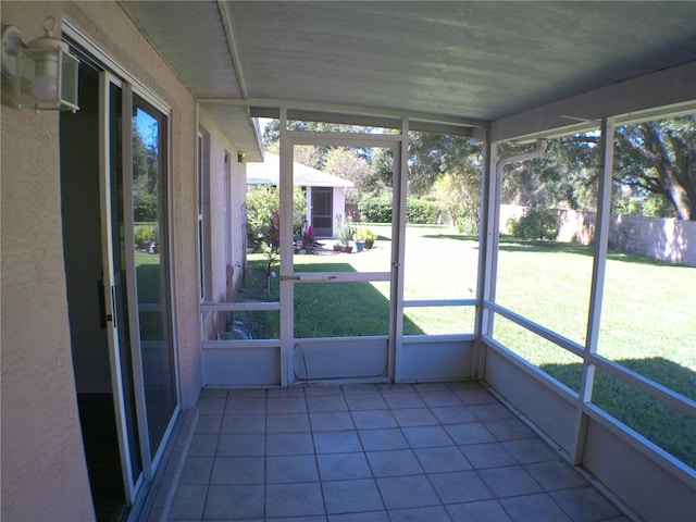 unfurnished sunroom with a healthy amount of sunlight