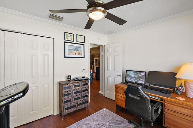 office featuring crown molding, dark wood-type flooring, and ceiling fan