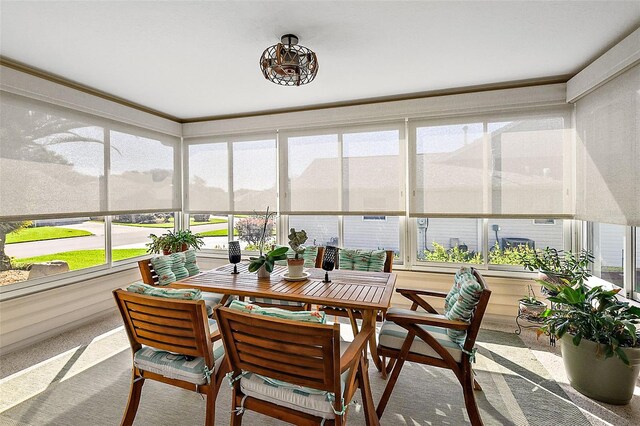 sunroom / solarium featuring plenty of natural light