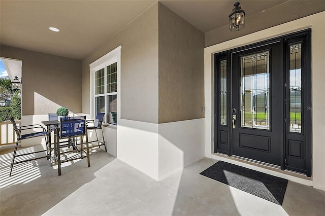 property entrance featuring french doors