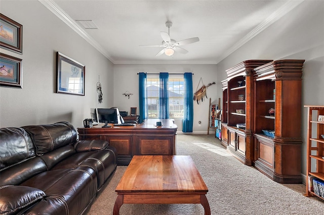 office with ornamental molding, light carpet, and ceiling fan