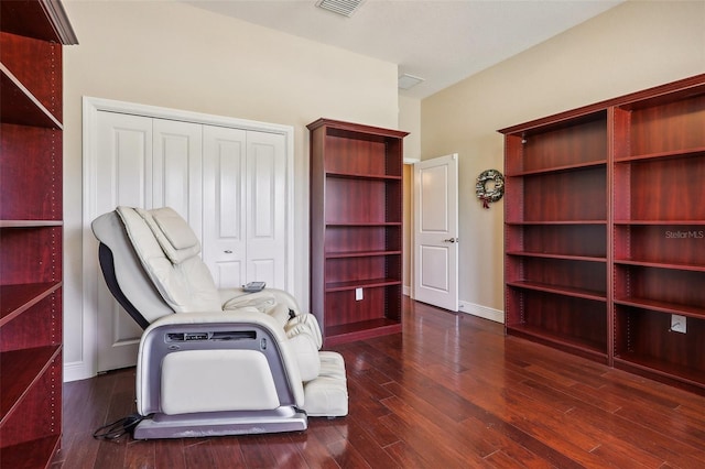 sitting room with dark hardwood / wood-style floors