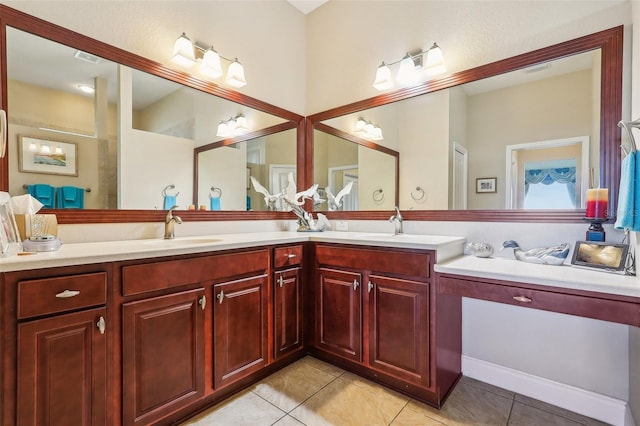 bathroom featuring vanity and tile patterned floors