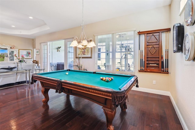 game room featuring a raised ceiling, billiards, and hardwood / wood-style floors