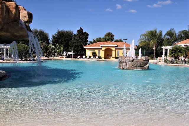 view of pool featuring pool water feature