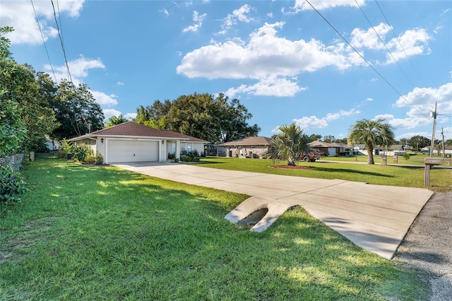 view of front facade featuring a front lawn and a garage