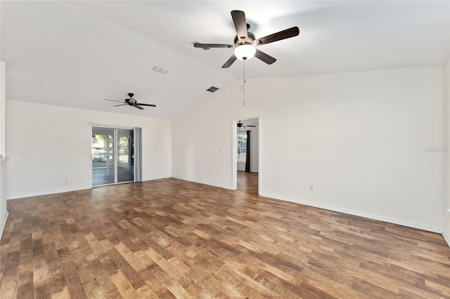 unfurnished room with hardwood / wood-style floors, vaulted ceiling, and ceiling fan