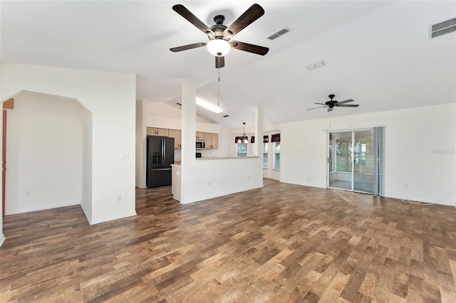 unfurnished living room featuring ceiling fan, dark hardwood / wood-style flooring, and lofted ceiling