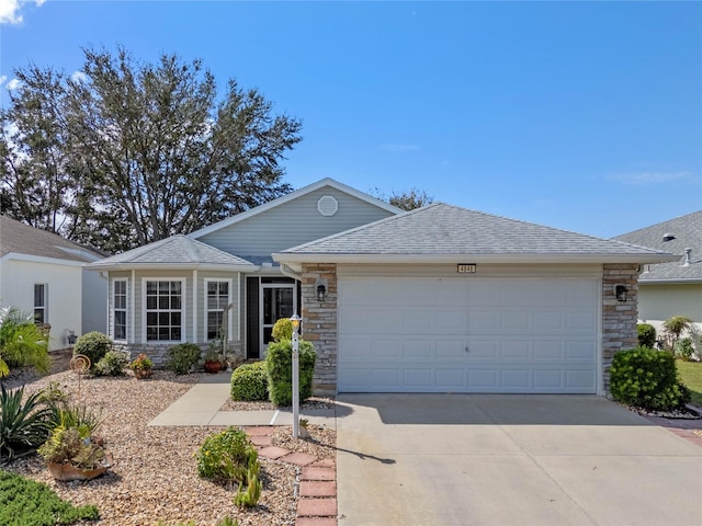 single story home featuring a garage