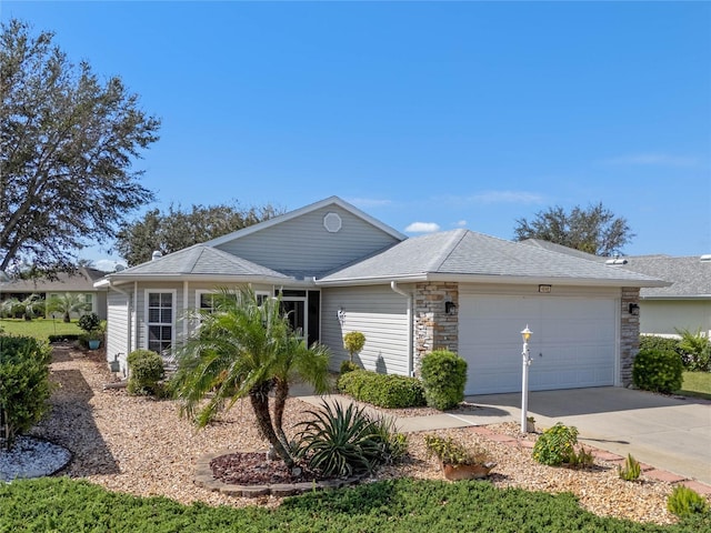 ranch-style house featuring a garage