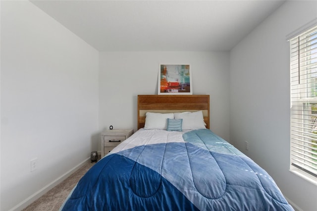 656 Daring Dr, Davenport, FL 33837 - bedroom featuring baseboards and carpet