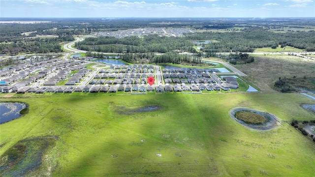 656 Daring Dr, Davenport, FL 33837 - drone / aerial view featuring a water view and a residential view