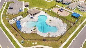 656 Daring Dr, Davenport, FL 33837 - aerial view of a pool area