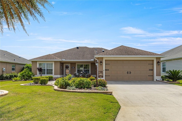 ranch-style home featuring a garage and a front lawn